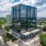 The exterior of the 400H Apartments for rent in Raleigh, NC, featuring a modern facade and view of the city.