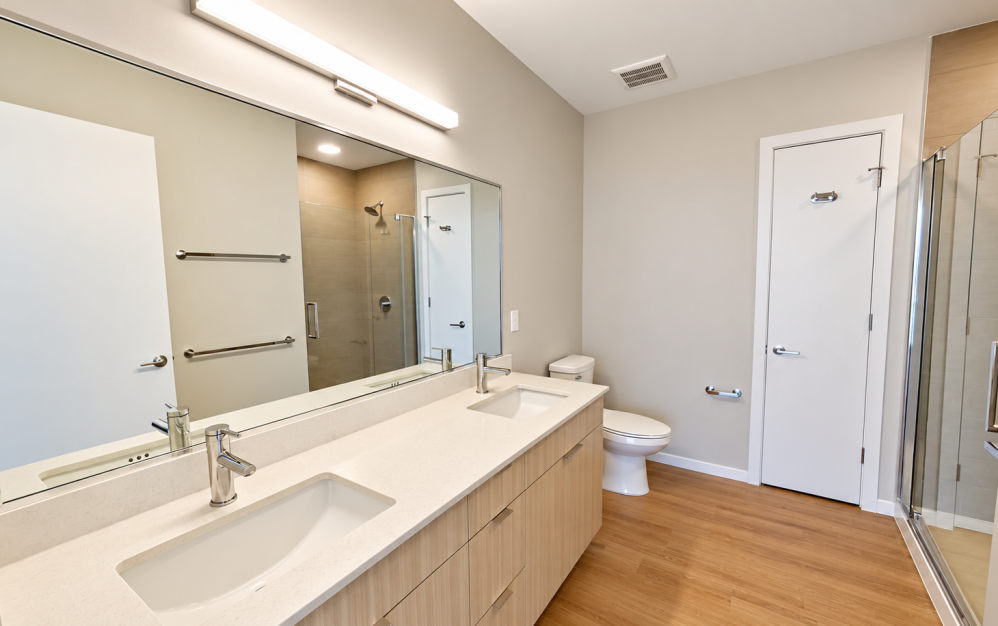 B05 - 2 bedroom floorplan layout with 2 bathrooms and 1034 square feet (Spa-Inspired Double-Vanity Bathroom)